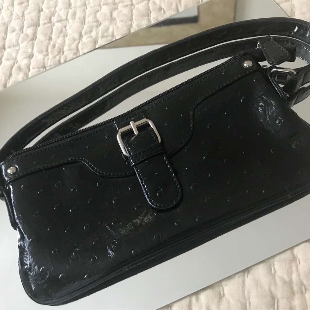 Poppie Jones black clutch
